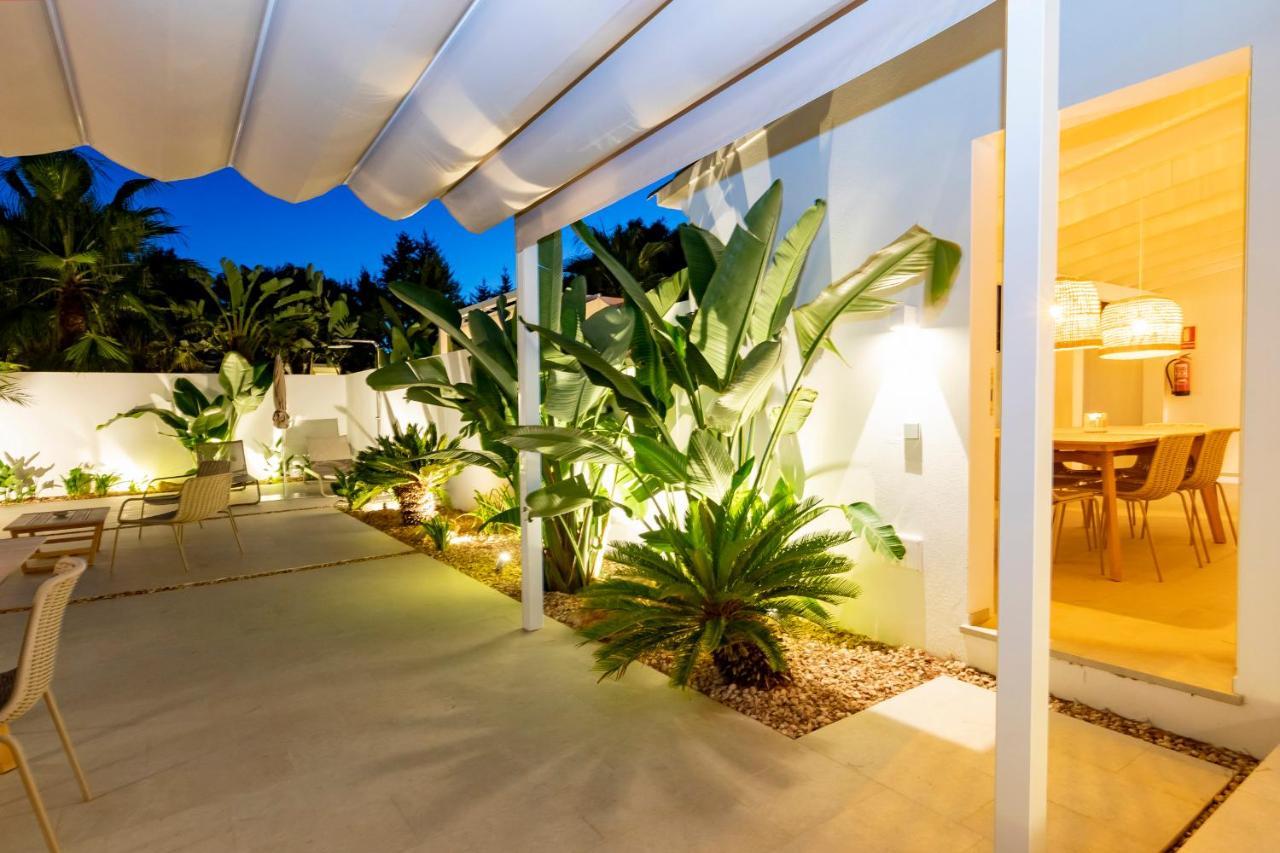 Ses Eufabietes Apartments & Restaurant Playa Migjorn Bagian luar foto