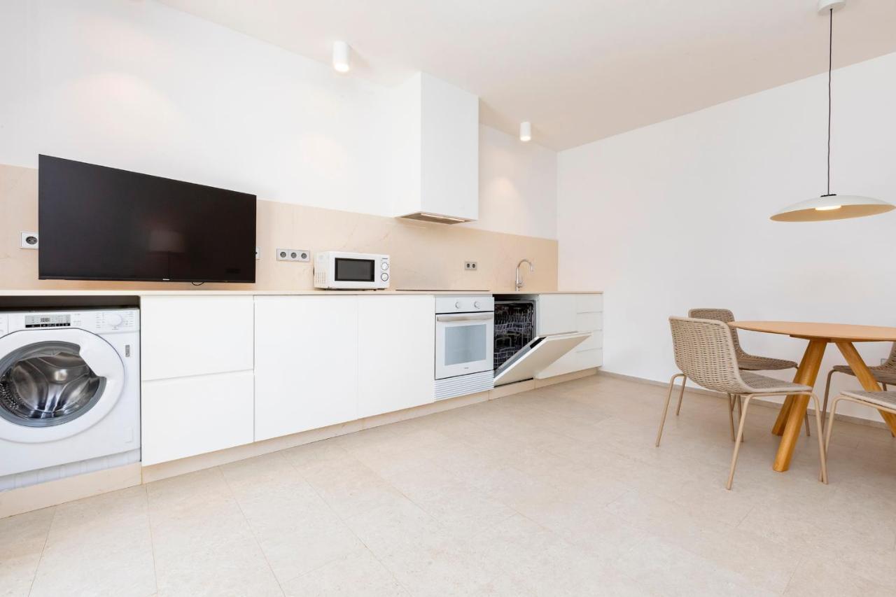 Ses Eufabietes Apartments & Restaurant Playa Migjorn Bagian luar foto