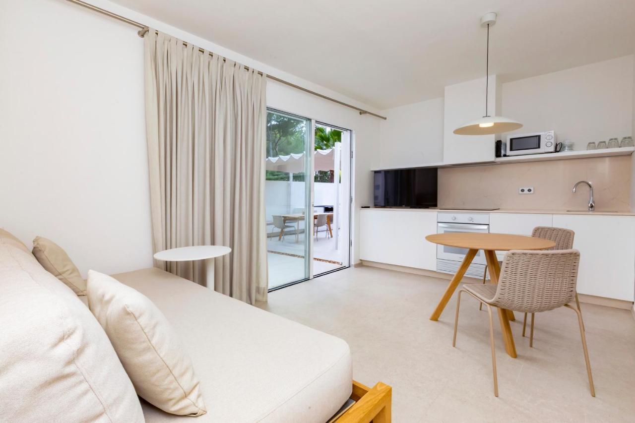 Ses Eufabietes Apartments & Restaurant Playa Migjorn Bagian luar foto