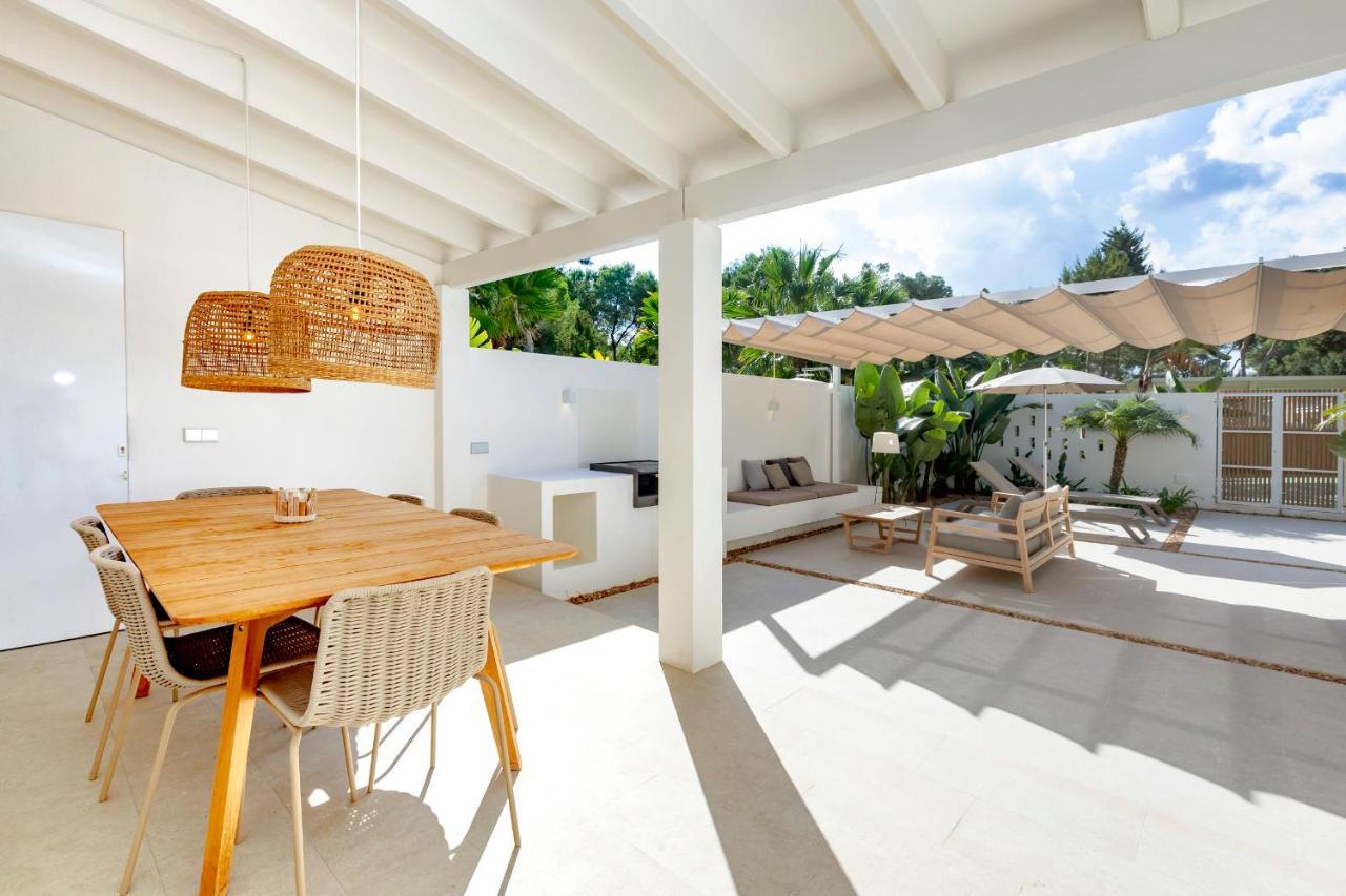 Ses Eufabietes Apartments & Restaurant Playa Migjorn Bagian luar foto