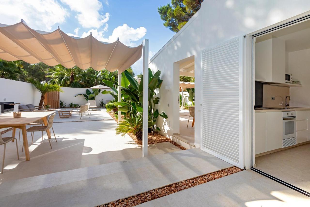 Ses Eufabietes Apartments & Restaurant Playa Migjorn Bagian luar foto