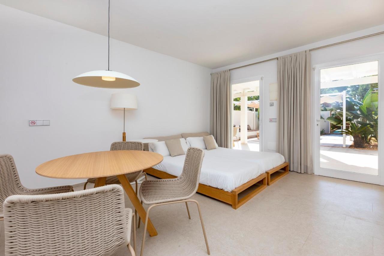 Ses Eufabietes Apartments & Restaurant Playa Migjorn Bagian luar foto