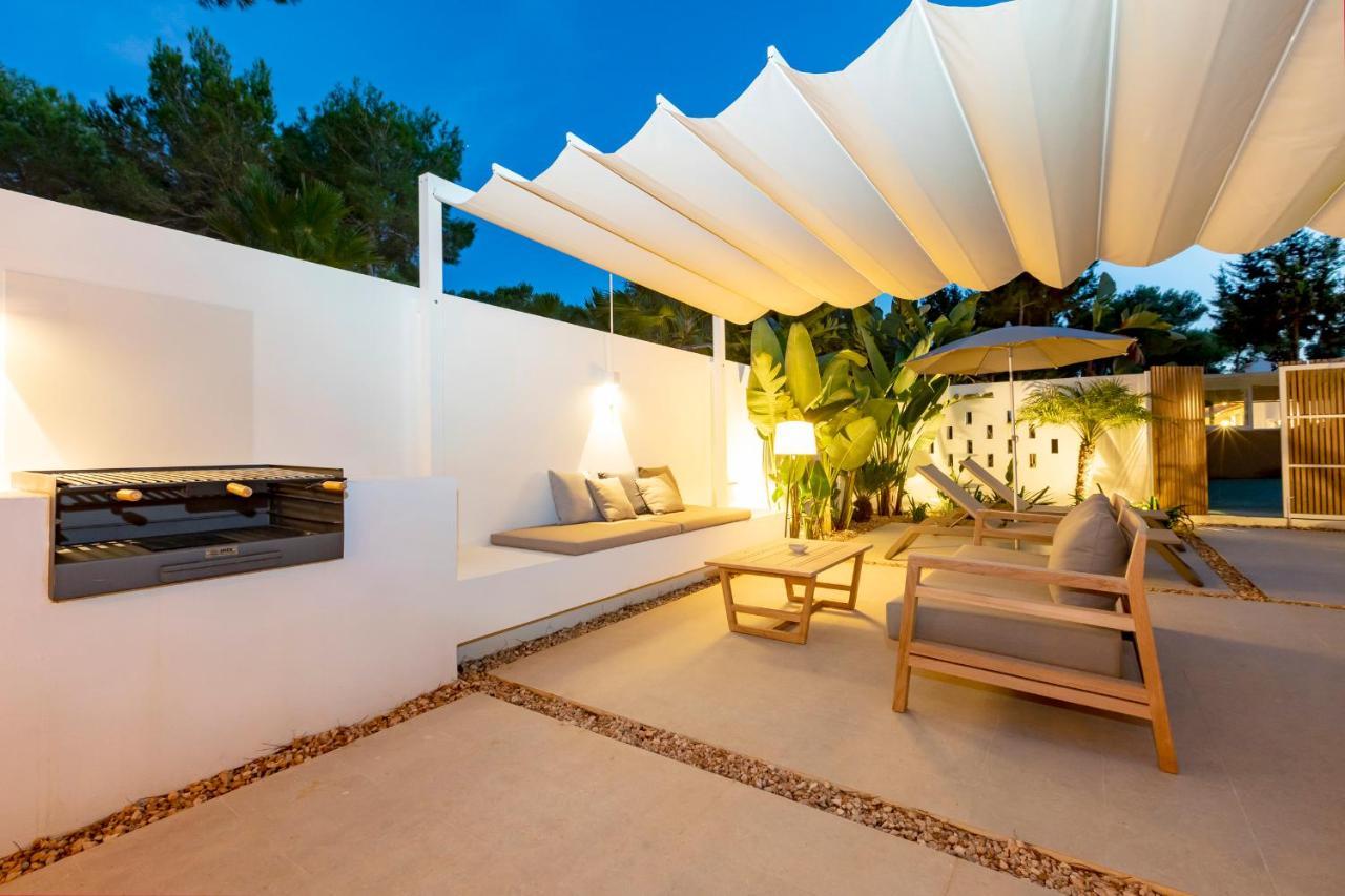 Ses Eufabietes Apartments & Restaurant Playa Migjorn Bagian luar foto