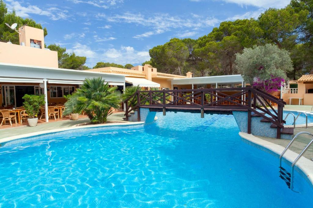 Ses Eufabietes Apartments & Restaurant Playa Migjorn Bagian luar foto